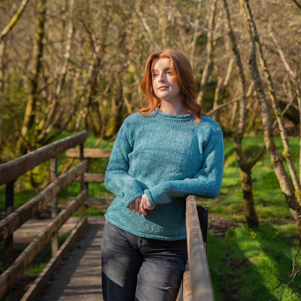 ladies blue wool roll neck jumper worn outdoors